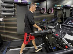 David Bloom testing a Spirit Fitness treadmill